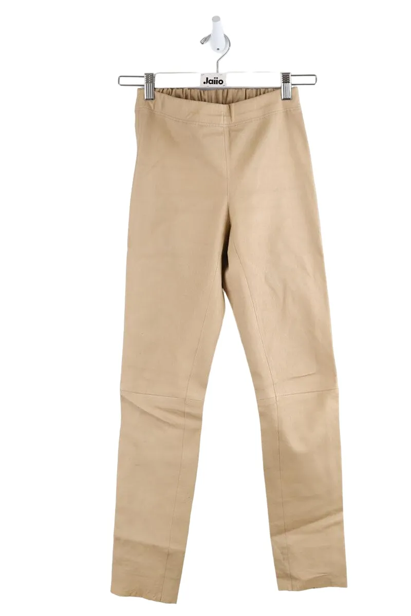 Pantalon slim en cuir Beige