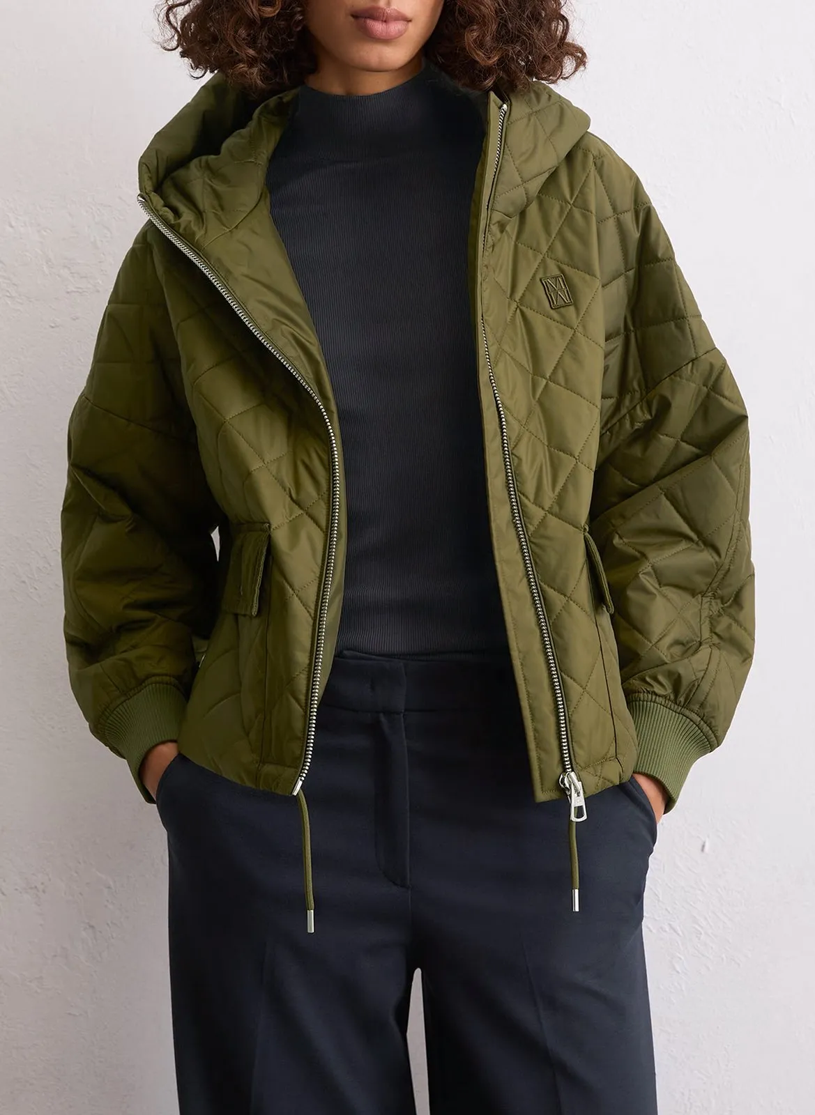 Veste matelassée unie à capuche Vert